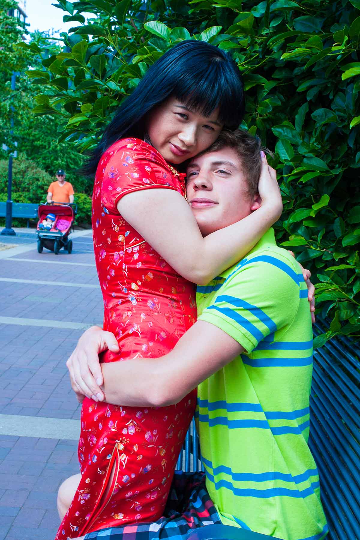 Chun Hua Catherine Dong asks strangers on streets to be her husbands for a minute, this man wearing green T-Shirt is one of her one-minute husbands  