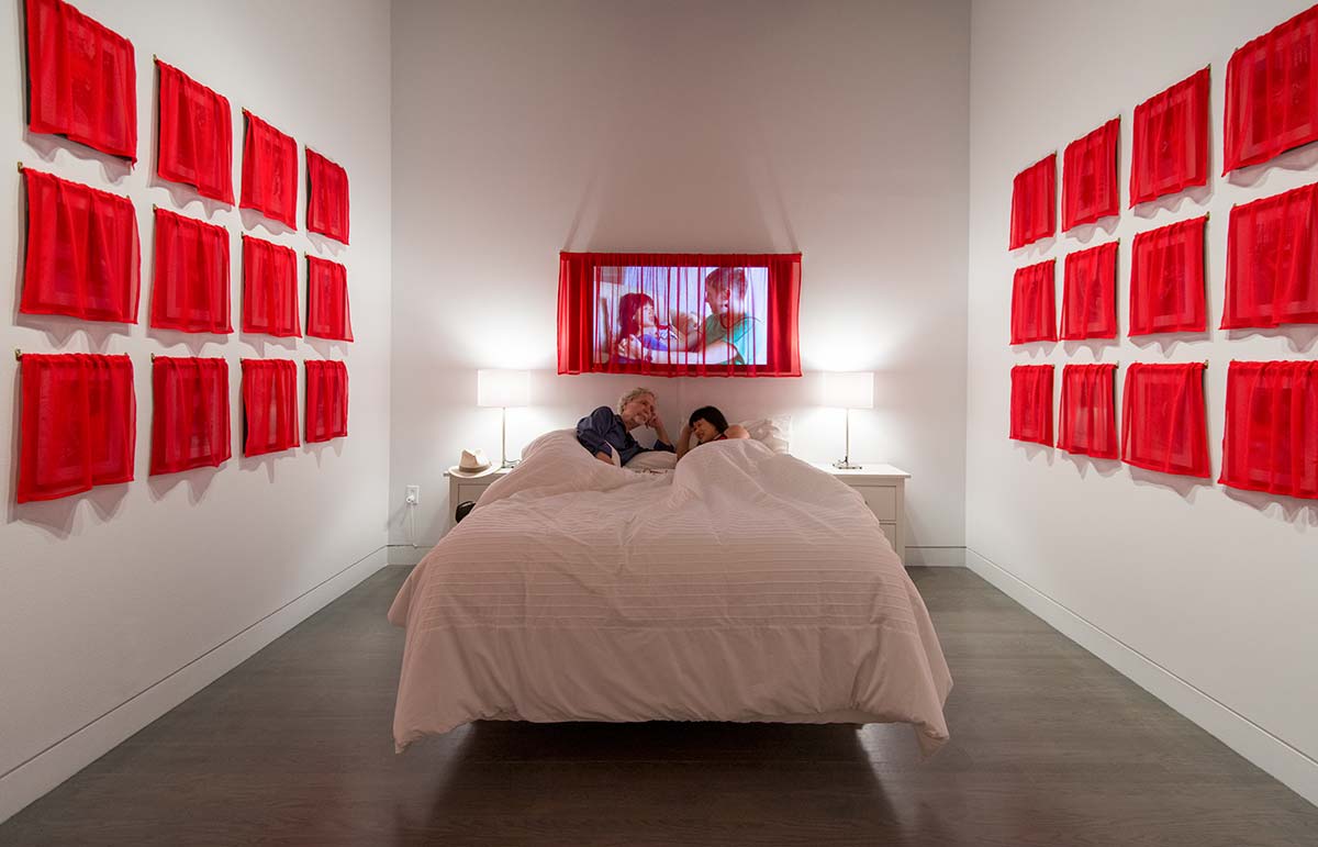 an audience slept with Chun Hua Catherine Dong when she stayed on her bed for 60 hours as part of her Husbands and I exhibition at Leonard & Bina Ellen Art Gallery in 2012