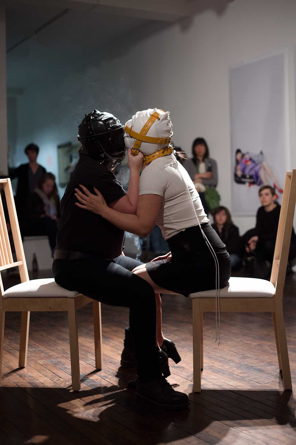 Chun Hua Catherine Dong performs at Articule Montreal: two girls kiss each other while wearing masks