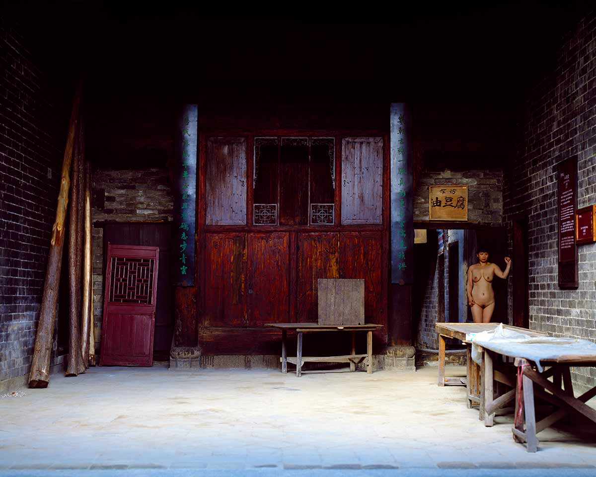 Chun Hua Catherine Dong re-visited a village in China where she was born. She walked in the village to seek out shadows and coroners in which to conceal herself 