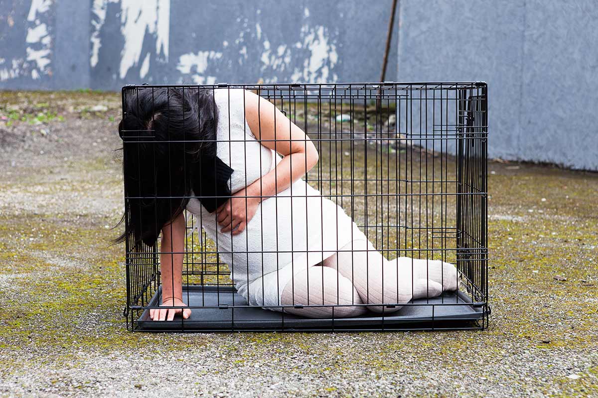 Chun Hua Catherine Dong was pregnant and she locked herself in a dog cage for six hours in a public space in the city of Dublin in 2014