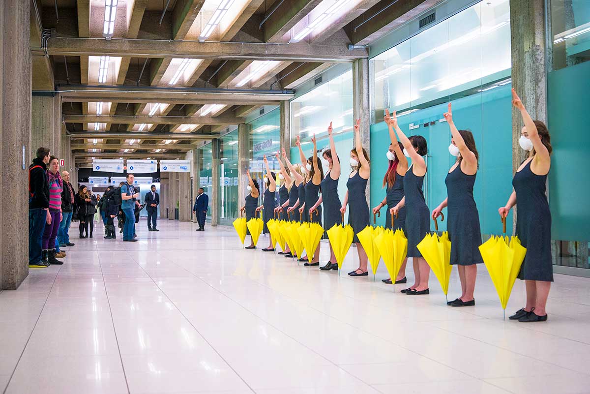 Chun Hua Catherine Dong's Yellow Umbrella performance: 12 females raise their three fingers to call three fundamental political rights