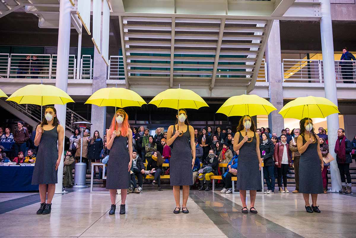 Chun Hua Catherine Dong's Yellow Umbrella performance at Universidad de Chile in Santiago as part of eX-centrico: dissidence, sovereignties, performance, organized by The Hemispheric Institute in 2016