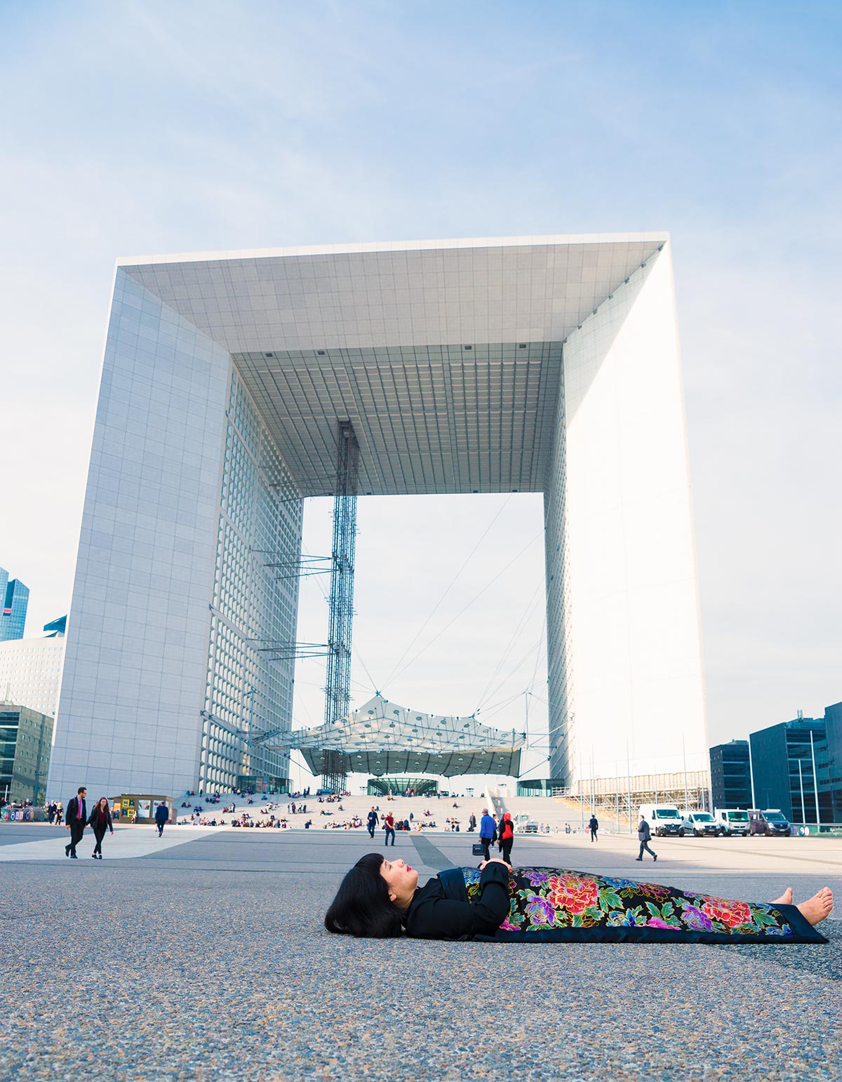 Chun Hua Catherine Dong celebrates her death and buries herself in front of Triumph tower Paris