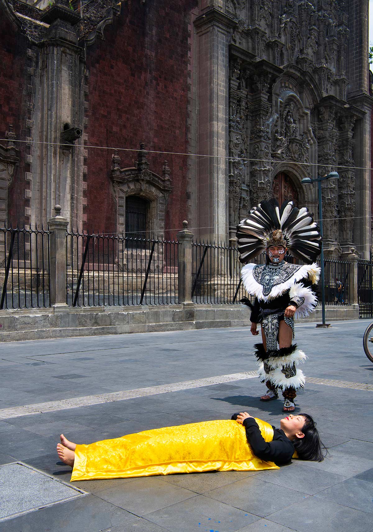 A native man performs ritual on Chun Hua Catherine Dong in Mexico City