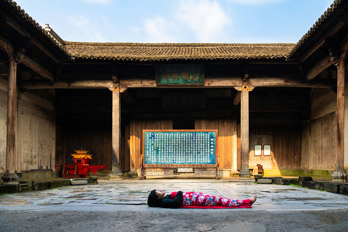 Chun Hua Catherine Dong celebrates her death and sleeps in an old house in HuangSha, China