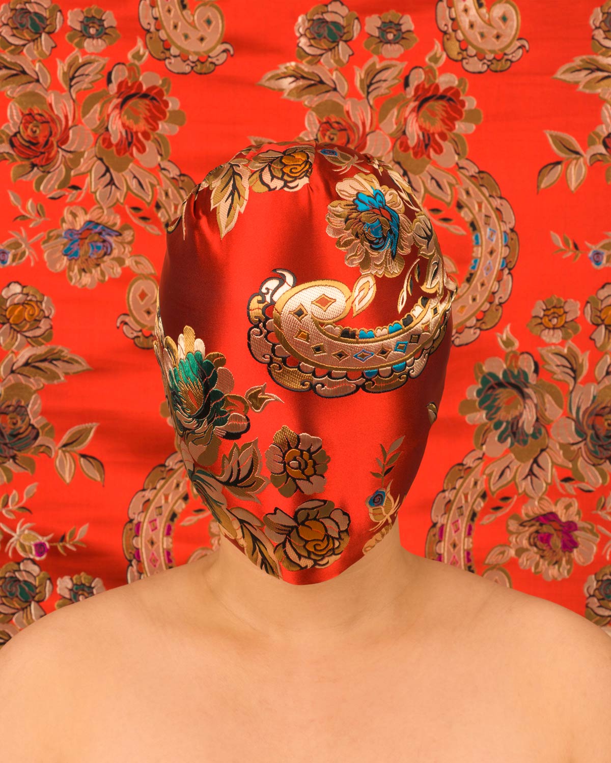 Chun Hua Catherine Dong masks her face with beautiful fabric to make shame visible