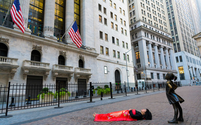 Chun Hua Catherine Dong is with the fearless girl in New York City