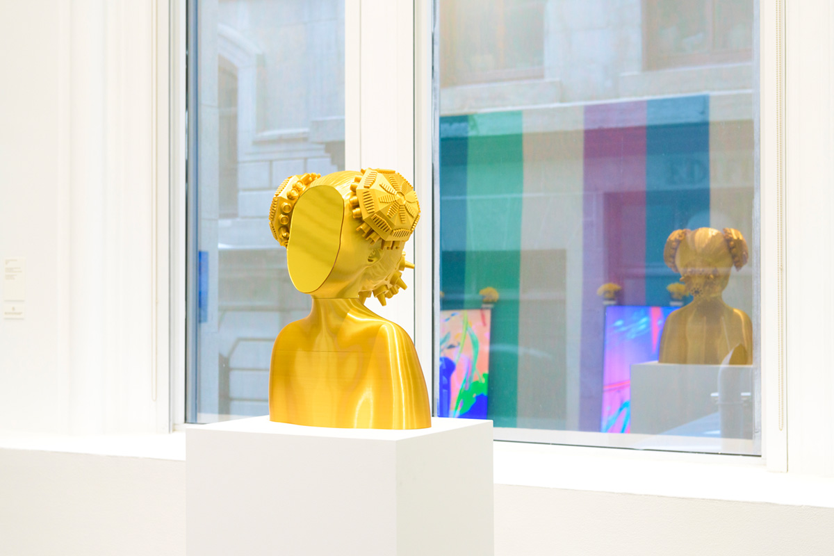  a yellow 3D printed bust girl without face