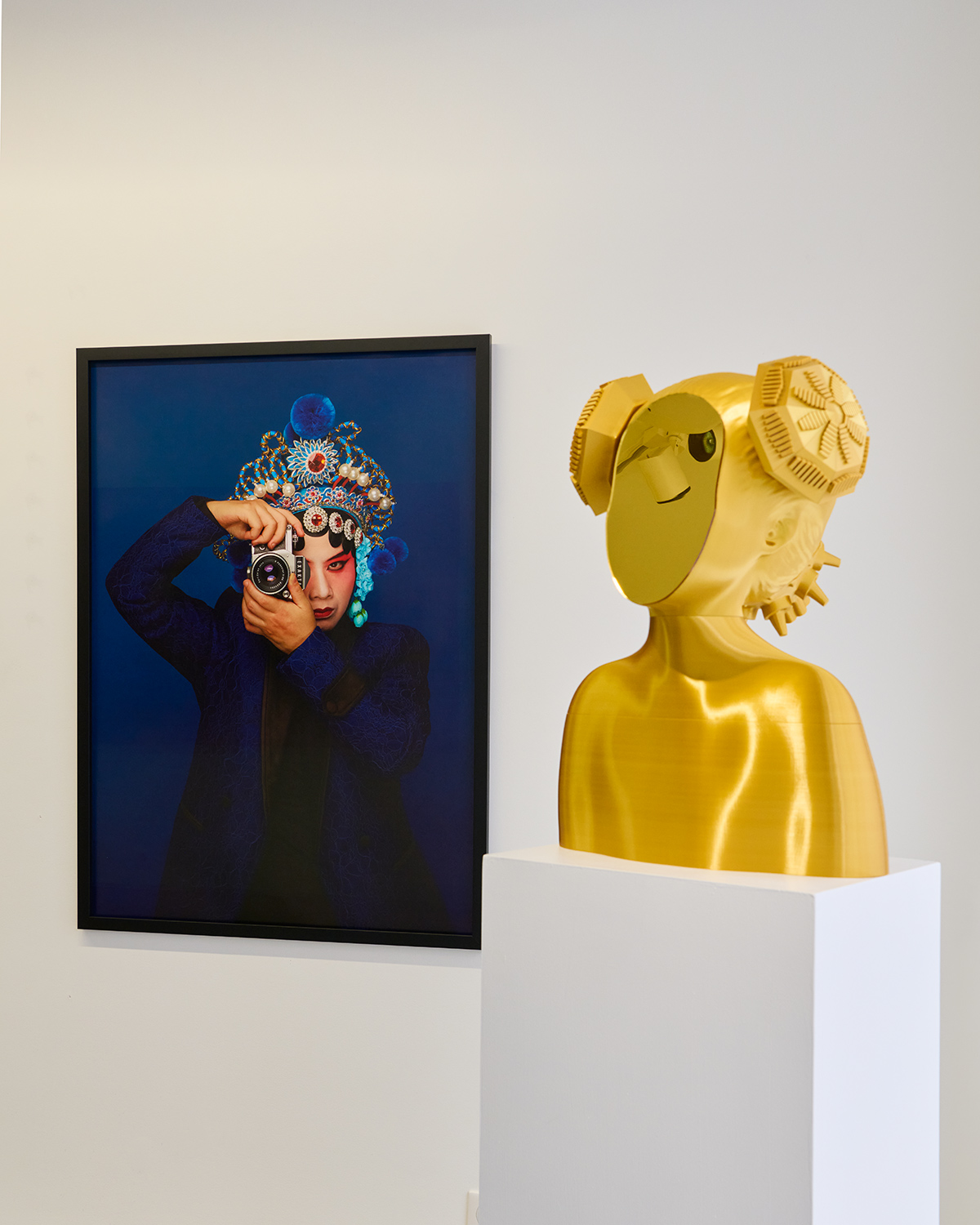 a self-portrait photograph and a gold girl 3D printed sculpture made by Chun Hua Catherine Dong at Galerie Charlot in Paris