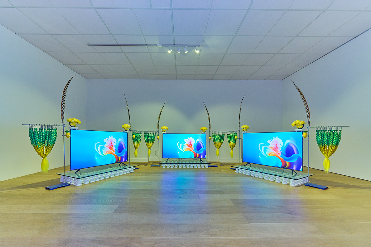 three channel video installation with green - yellow hair, feather, tempered glass and 3D printed bears