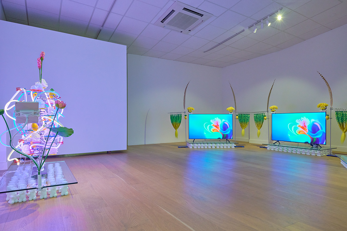 three channel video installation with green - yellow hair, feather, tempered glass and 3D printed bears, and a light installation