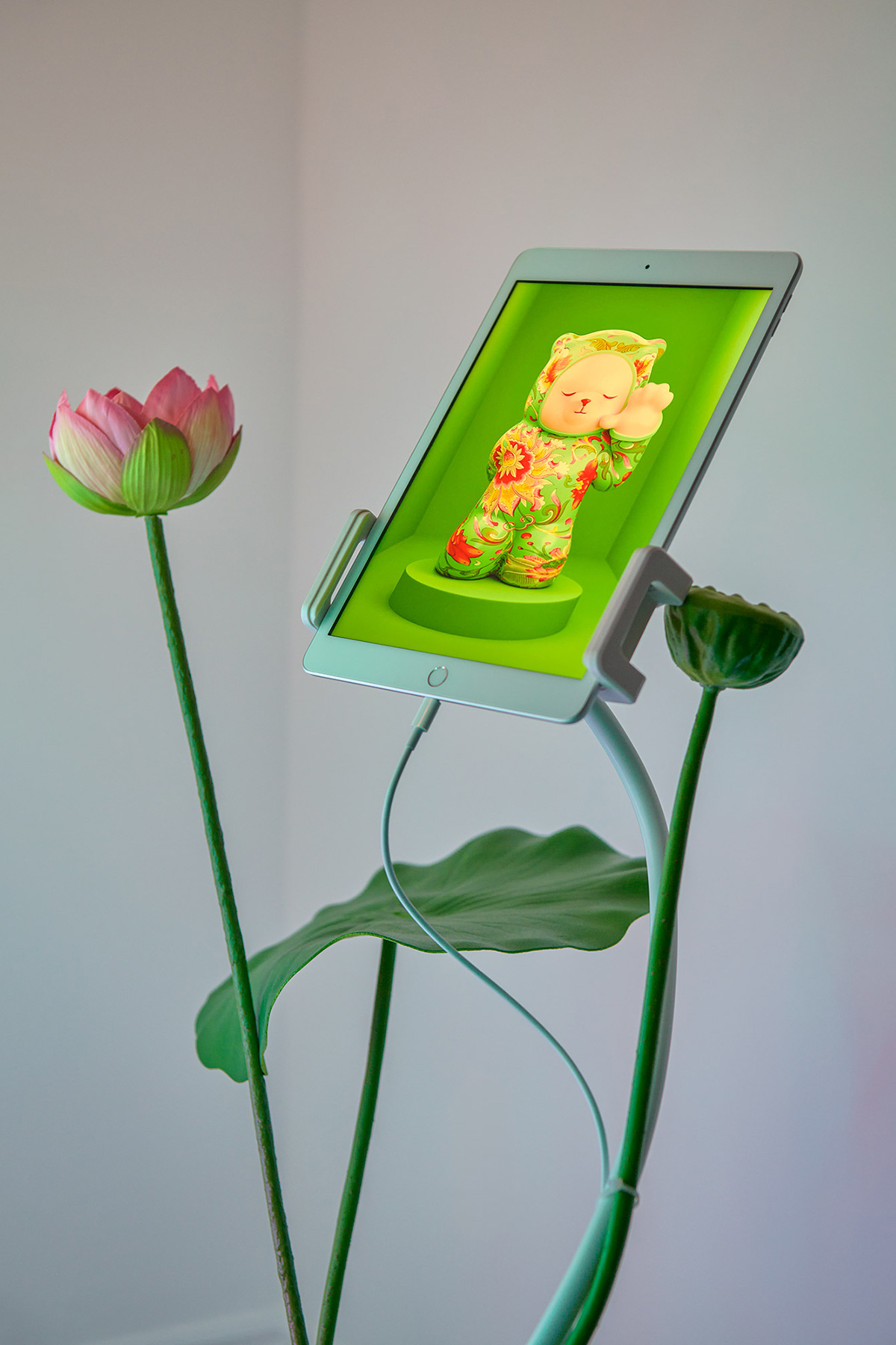 lotus flower with an iPad playing bear animation